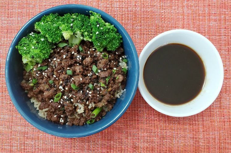 Korean flavored ground beef served over rice with broccoli